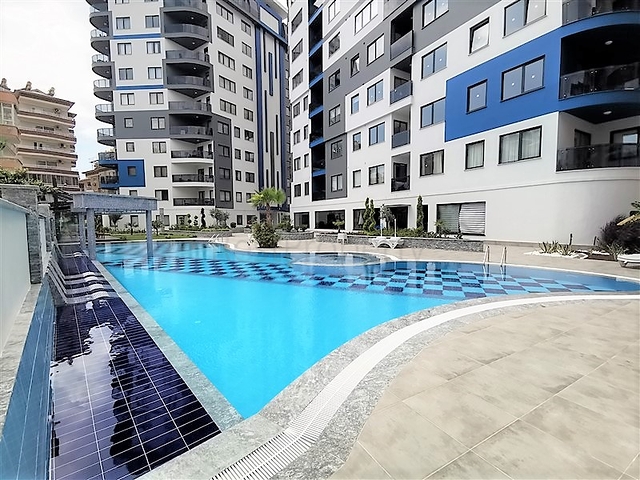 شقة غرفتين وصالة مفروشة -ضمن مجمع سكني حديث -في مركز الانيا 