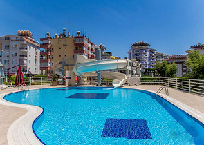 اطلالة مفتوحة - شقة غرفتين وصالة واسعة -ضمن مجمع يضم كافة الخدمات في جيكجلي / الانيا 