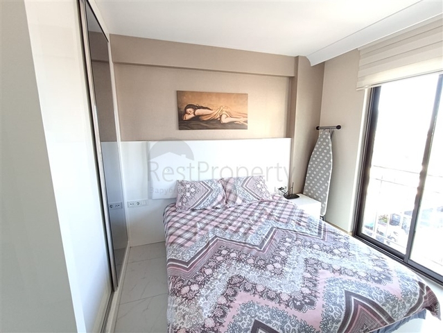 مناسبة للاستثمار - شقة غرفة وصالة مفروشة -ضمن مجمع يضم كافة الخدمات في مركز الانيا 