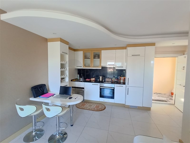 مناسبة للاستثمار - شقة غرفة وصالة مفروشة -ضمن مجمع يضم كافة الخدمات في مركز الانيا 