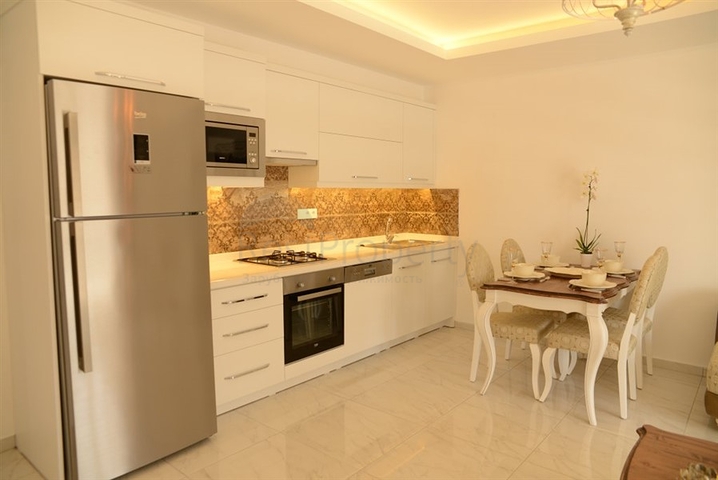 شقة غرفتين وصالة - مفروشة - ضمن مجمع يضم كافة الخدمات - في محمودلار / الانيا 