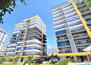 شقة غرفتين وصالة - مفروشة - ضمن مجمع يضم كافة الخدمات - في محمودلار / الانيا 