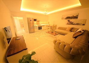 شقة غرفتين وصالة - مفروشة - ضمن مجمع يضم كافة الخدمات - في محمودلار / الانيا 