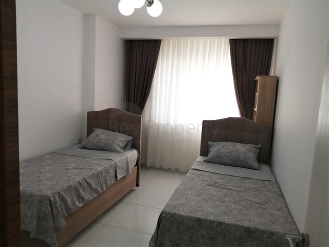 ضمن مجمع فاخر - شقة غرفتين وصالة مفروشة - مطبخ منفصل - في محمودلار / الانيا 