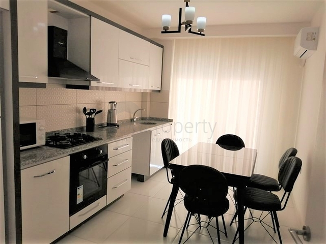 ضمن مجمع فاخر - شقة غرفتين وصالة مفروشة - مطبخ منفصل - في محمودلار / الانيا 