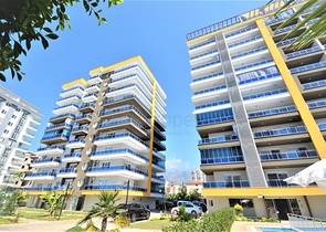 ضمن مجمع فاخر - شقة غرفتين وصالة مفروشة - مطبخ منفصل - في محمودلار / الانيا 