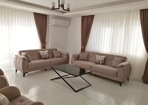 ضمن مجمع فاخر - شقة غرفتين وصالة مفروشة - مطبخ منفصل - في محمودلار / الانيا 