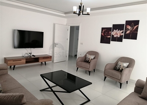 ضمن مجمع فاخر - شقة غرفتين وصالة مفروشة - مطبخ منفصل - في محمودلار / الانيا 