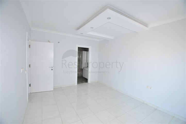 شقة غرفتين وصالة - ضمن مجمع سكني في محمودلار / الانيا 