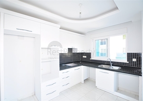 شقة غرفتين وصالة - ضمن مجمع سكني في محمودلار / الانيا 