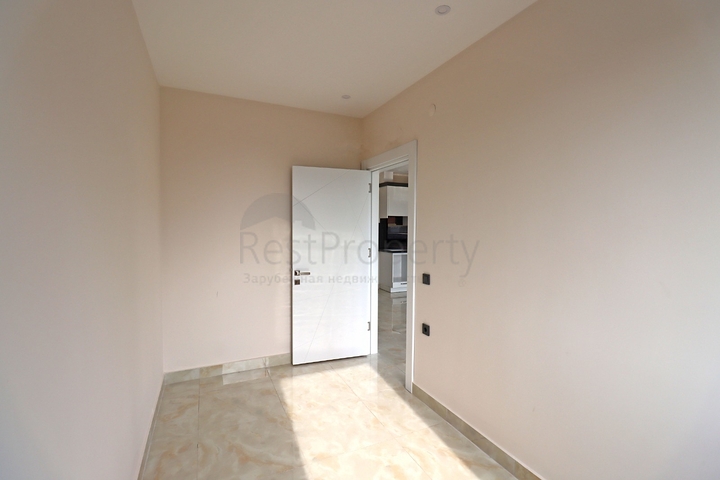 شقة غرفتين وصالة -ضمن مجمع جديد - في مركز الانيا 