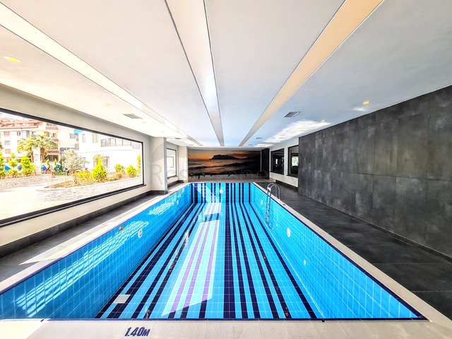 شقة غرفتين وصالة -ضمن مجمع جديد - في مركز الانيا 