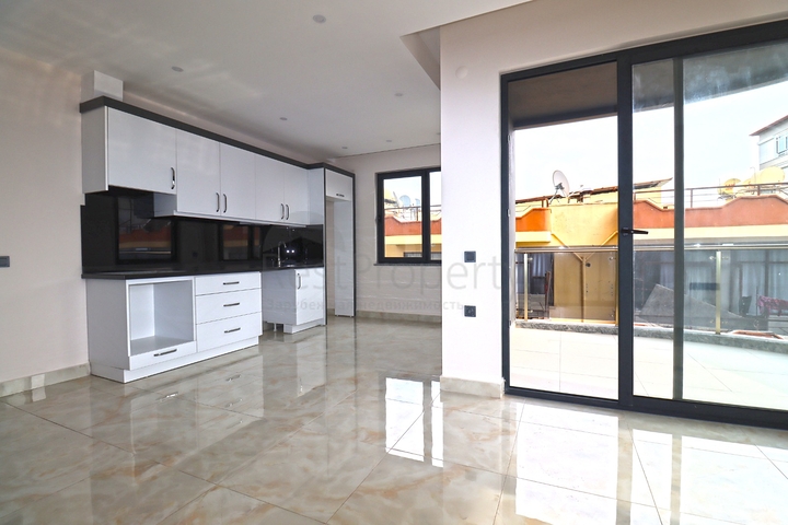 شقة غرفتين وصالة -ضمن مجمع جديد - في مركز الانيا 