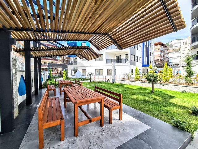 شقة غرفتين وصالة -ضمن مجمع جديد - في مركز الانيا 