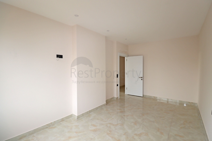 شقة غرفتين وصالة -ضمن مجمع جديد - في مركز الانيا 