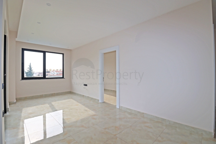 شقة غرفتين وصالة -ضمن مجمع جديد - في مركز الانيا 