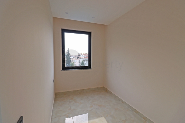 شقة غرفتين وصالة -ضمن مجمع جديد - في مركز الانيا 