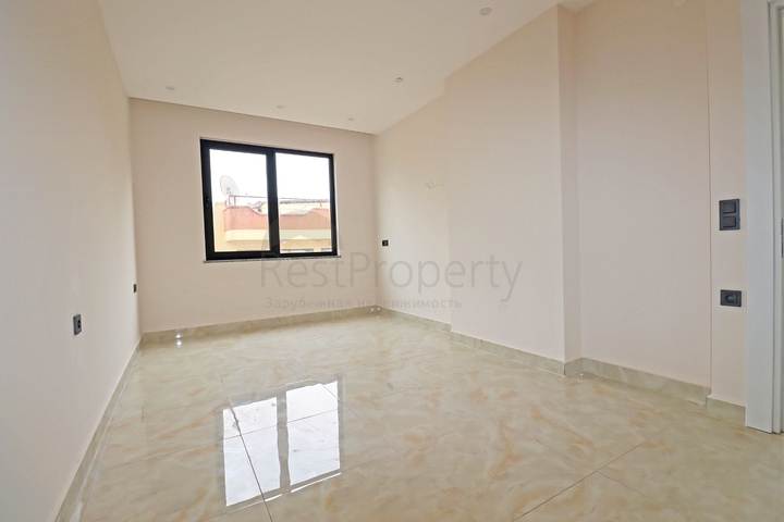 شقة غرفتين وصالة -ضمن مجمع جديد - في مركز الانيا 