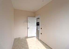 شقة غرفتين وصالة -ضمن مجمع جديد - في مركز الانيا 