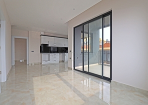 شقة غرفتين وصالة -ضمن مجمع جديد - في مركز الانيا 