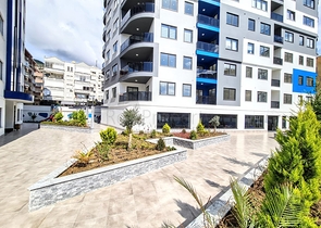 شقة غرفتين وصالة -ضمن مجمع جديد - في مركز الانيا 