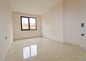 شقة غرفتين وصالة -ضمن مجمع جديد - في مركز الانيا 