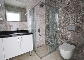 شقة غرفتين وصالة -ضمن مجمع جديد - في مركز الانيا 