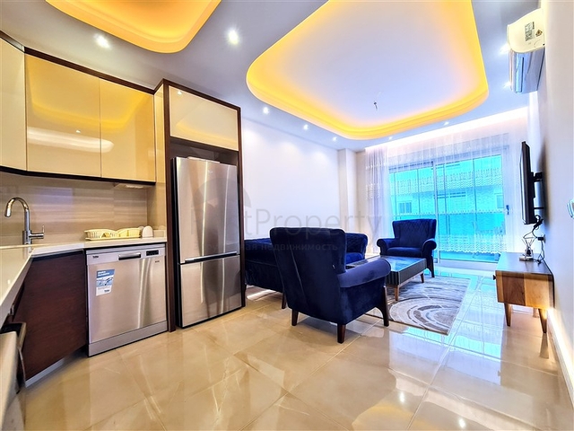 مجمع يضم كافة الخدمات - شقة غرفة وصالة مفروشة - في محمودلار / الانيا 