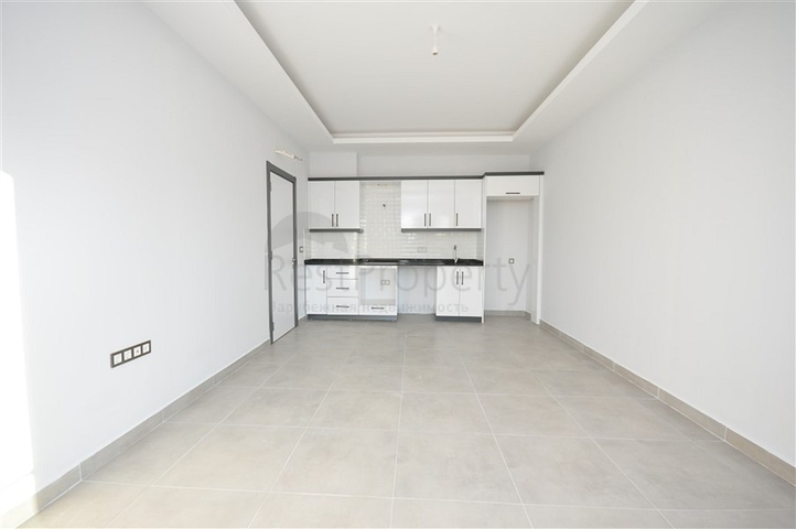 شقة غرفة وصالة - ضمن مجمع سكني جديد - في محمودلار / الانيا 