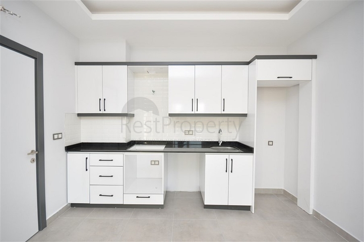 شقة غرفة وصالة - ضمن مجمع سكني جديد - في محمودلار / الانيا 