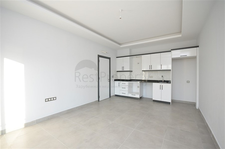 شقة غرفة وصالة - ضمن مجمع سكني جديد - في محمودلار / الانيا 