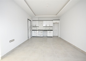 شقة غرفة وصالة - ضمن مجمع سكني جديد - في محمودلار / الانيا 