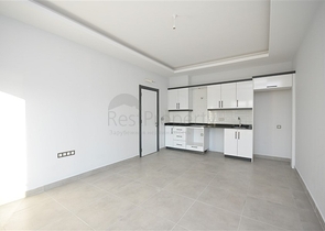 شقة غرفة وصالة - ضمن مجمع سكني جديد - في محمودلار / الانيا 