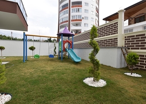 شقة غرفة وصالة - ضمن مجمع سكني جديد - في محمودلار / الانيا 