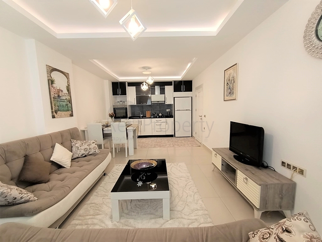 شقة مفروشة - غرفة نوم وصالة -ضمن مجمع يضم خدمات - في محمودلار / الانيا 