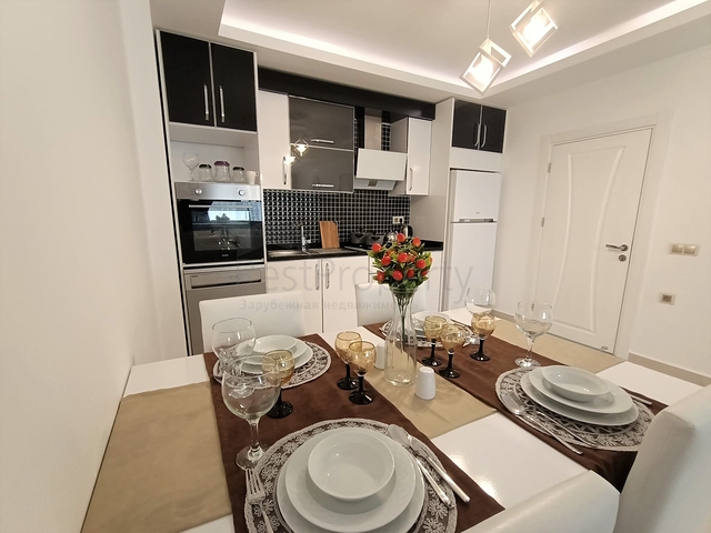 شقة مفروشة - غرفة نوم وصالة -ضمن مجمع يضم خدمات - في محمودلار / الانيا 