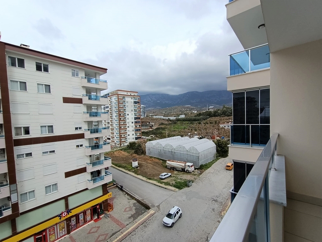 شقة مفروشة - غرفة نوم وصالة -ضمن مجمع يضم خدمات - في محمودلار / الانيا 