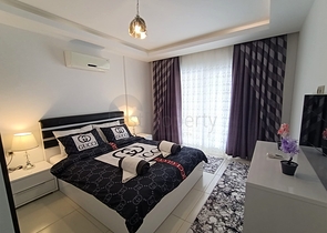 شقة مفروشة - غرفة نوم وصالة -ضمن مجمع يضم خدمات - في محمودلار / الانيا 