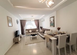 شقة مفروشة - غرفة نوم وصالة -ضمن مجمع يضم خدمات - في محمودلار / الانيا 