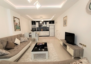 شقة مفروشة - غرفة نوم وصالة -ضمن مجمع يضم خدمات - في محمودلار / الانيا 