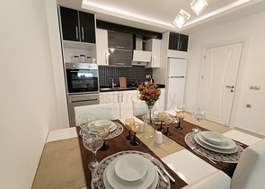 شقة مفروشة - غرفة نوم وصالة -ضمن مجمع يضم خدمات - في محمودلار / الانيا 