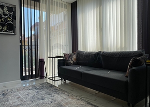 في مركز الانيا - وضمن مجمع سكني فاخر - شقة غرفة وصالة مفروشة .