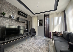 في مركز الانيا - وضمن مجمع سكني فاخر - شقة غرفة وصالة مفروشة .