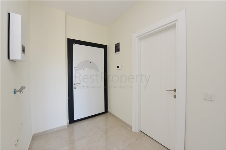 شقة جديدة للبيع - ضمن مجمع سكني في افسلار - تصميم غرفة وصالة . 