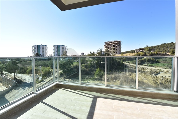 شقة جديدة للبيع - ضمن مجمع سكني في افسلار - تصميم غرفة وصالة . 