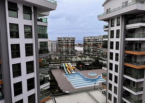 ضمن مجمع سكني عائلي - شقة غرفتين وصالة مفروشة - في افسلار / الانيا 