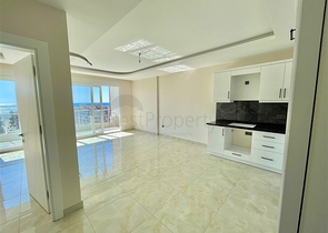 اطلالة بحر - شقة غرفة وصالة -ضمن مجمع جديد - في محمودلار / الانيا 