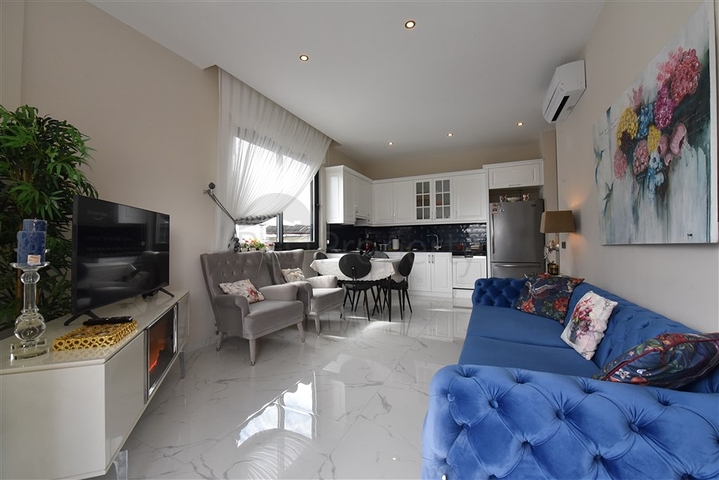 مجمع فاخر على البحر مباشرة - شقة غرفتين وصالة مفروشة - في اوبا / الانيا 