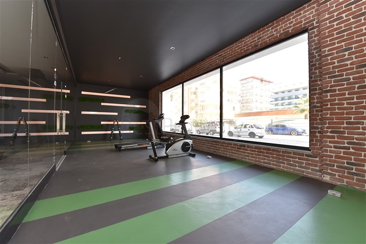 مجمع فاخر على البحر مباشرة - شقة غرفتين وصالة مفروشة - في اوبا / الانيا 