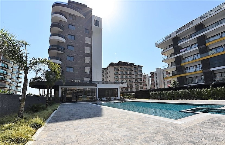 مجمع فاخر على البحر مباشرة - شقة غرفتين وصالة مفروشة - في اوبا / الانيا 